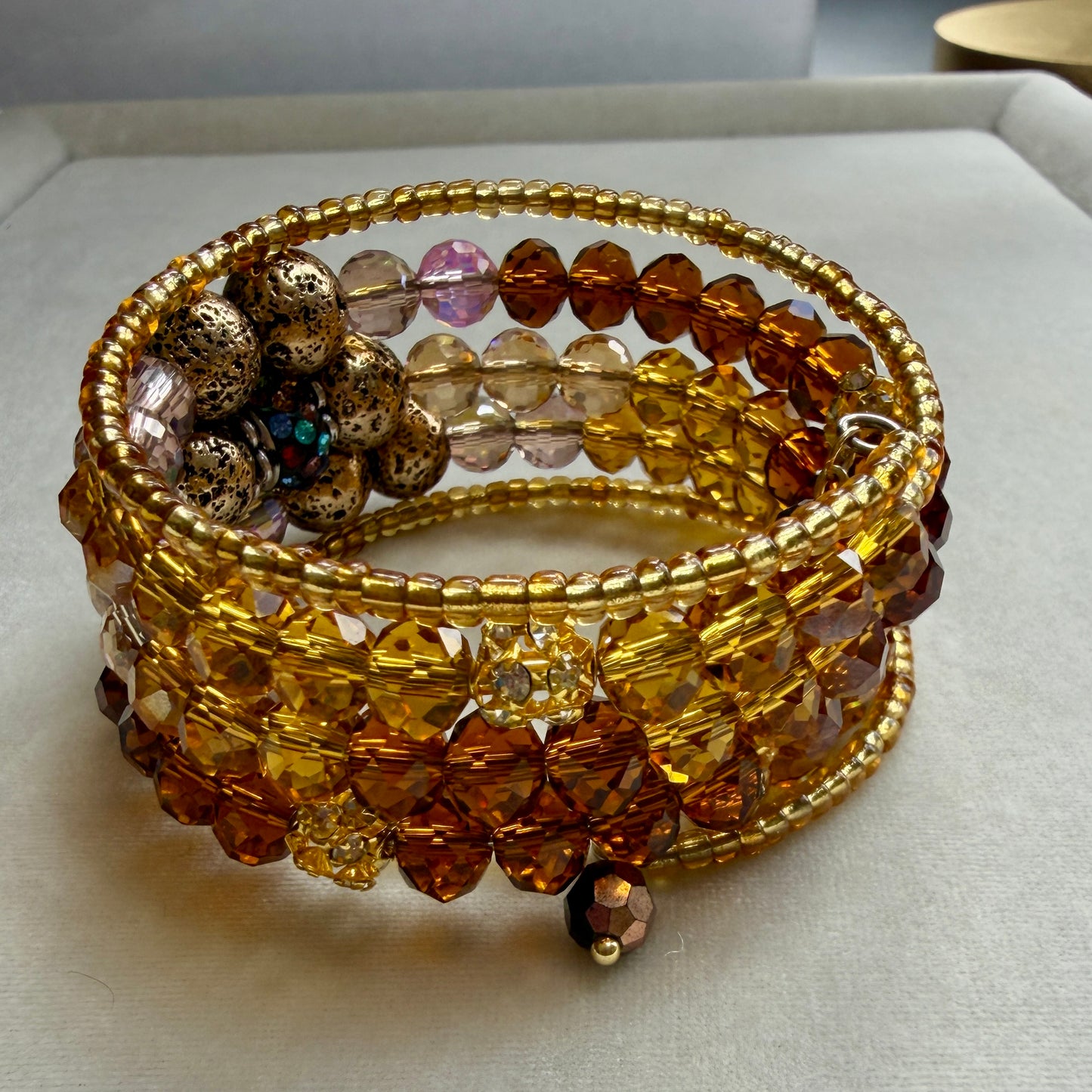 Golden Amber Memory Wire Bracelet with Antique Bronze Lava Flower